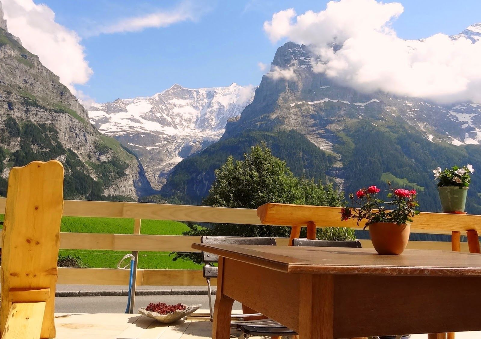 Terrace of Café 3692 with the Eiger rising behind